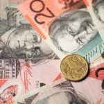 Australian dollar drops after RBA keeps rates unchanged, pointing to housing sector