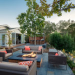 Why You Should Stage a Cozy Fire Pit Area