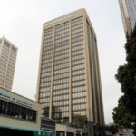 Two downtown highrises sell for $167M. Declining vacancies equal rising prices.