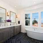 Dark-Floored Bathroom Offers Ocean Views From Tub and Shower (8 photos)
