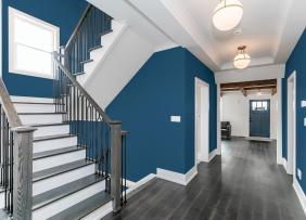 Stairwell with Blue walls and white accent