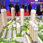 China's property market could see more pain, even as Evergrande crisis seems to be abating